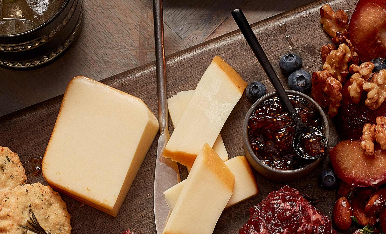 Naturally smoked Monterey jack cheese served with jam, blueberries and walnuts.